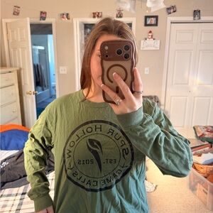 Green Long Sleeve Graphic Tee with Black Emblem